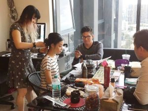 Black Avenue Productions team doing wedding makeup and hair at own home