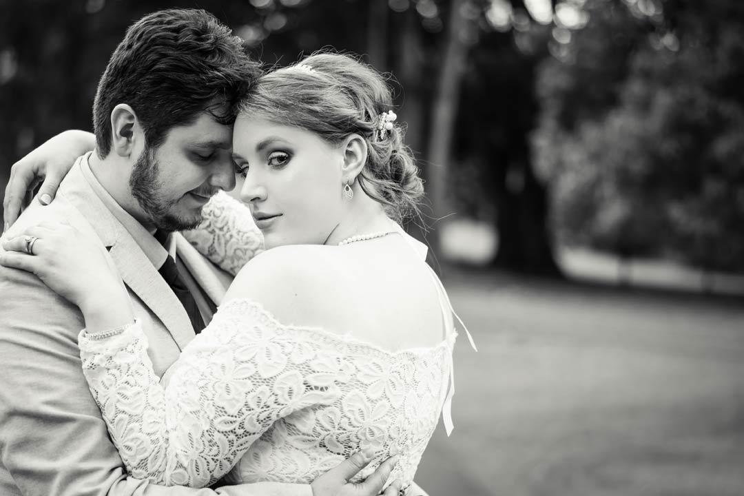 dream wedding picture in black and white with classic look bride and loving groom in garden near Victorian Marriage Registry