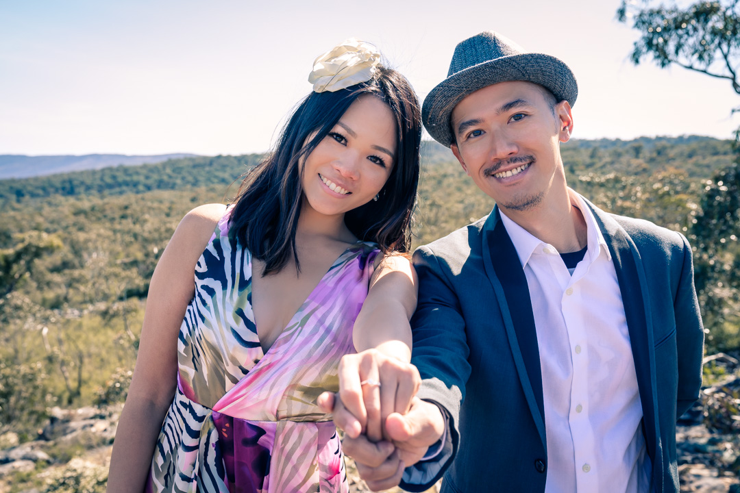 newly engaged couple showing off her engagement ring right after a surprise proposal at The Grampians national park in Australia