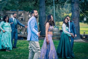 Melbourne bride groom and bridal party perform bollywood dance move at their Baxter Barn wedding event reception 2017