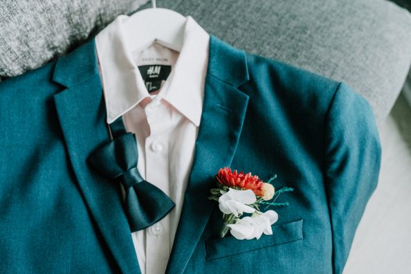 Gay wedding suit with matching corsage