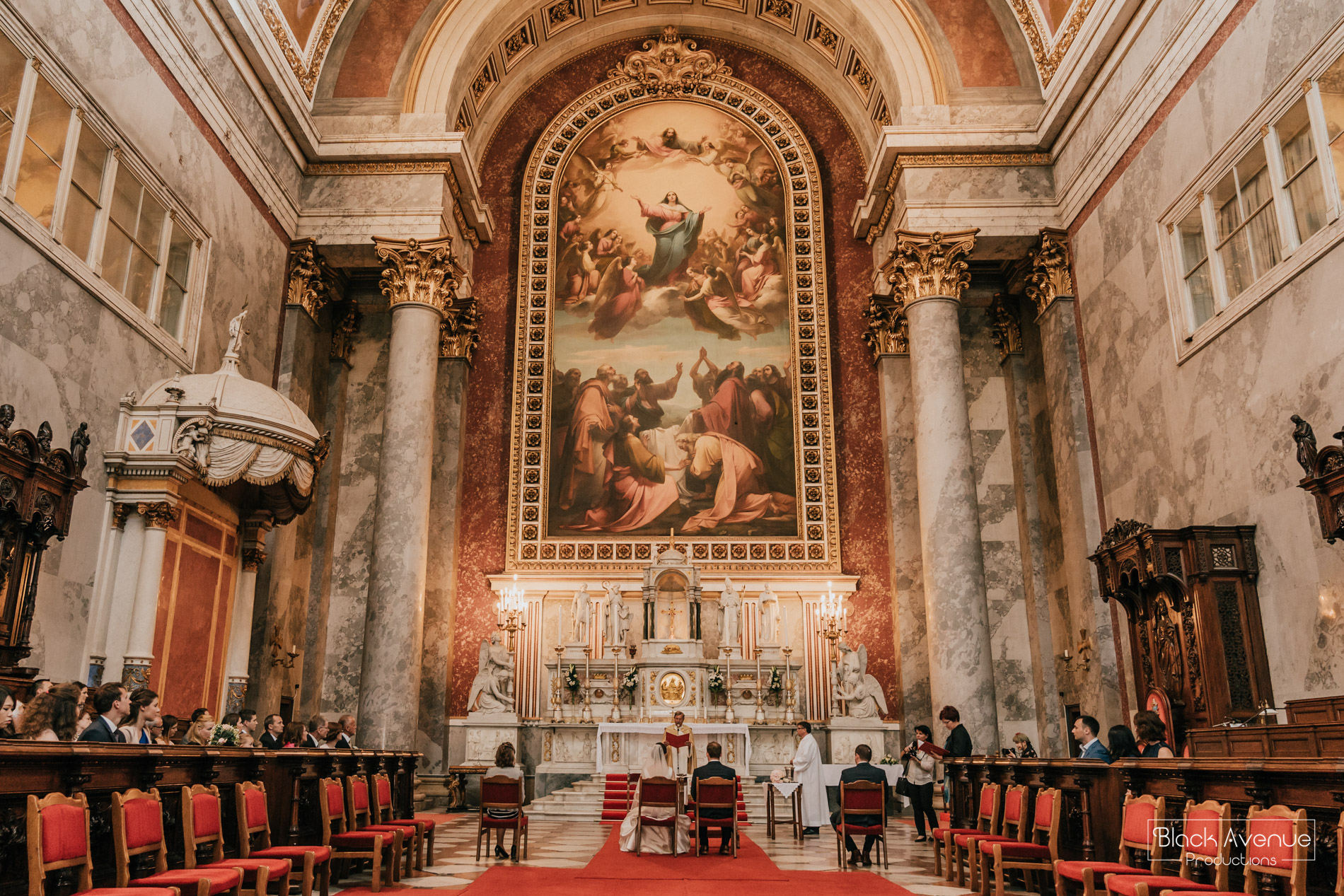 Stunning big church wedding basilica in Hungary real ceremony moment image by destination wedding photographers Black Avenue Productions