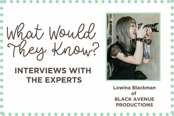 Blog banner of Expert wedding photographer interview by Polka Dot Bride magazine 2020 with self portrait of Lowina Blackman holding on a Sony A9 camera
