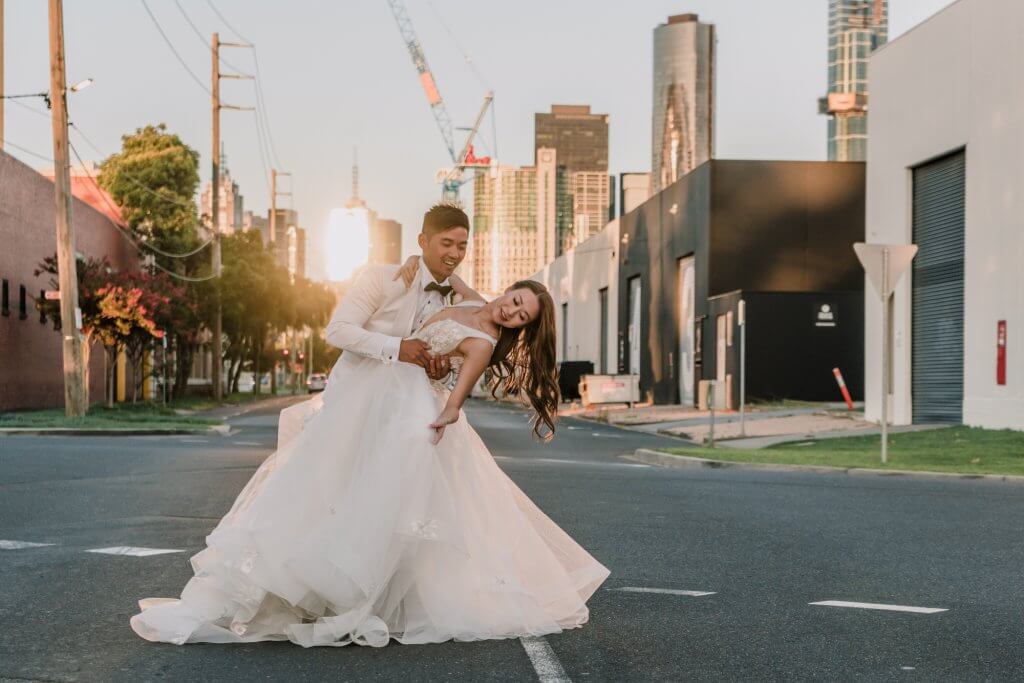 Melbourne newly wedded couple with a golden hour glow setting wedding shot by Black Avenue Productions