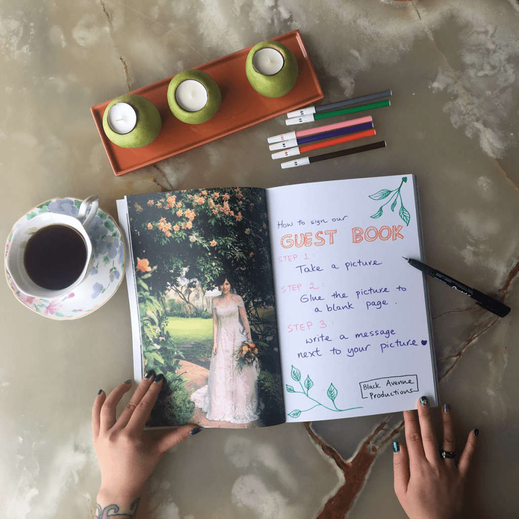 beautiful guest book wedding album with coffee and candles