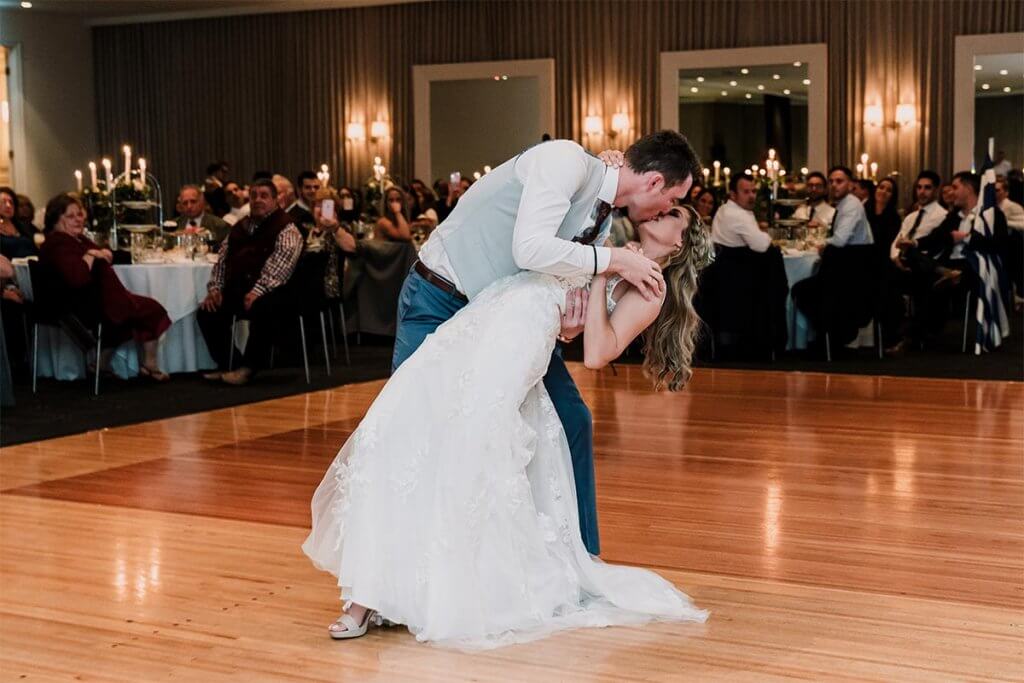 newlywed's first dance with kiss