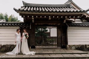 Destination Wedding Photography lovely brides posing outside a Japanese house
