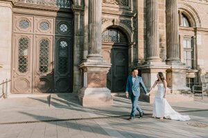 Destination Wedding Photography Couple walking while holding hands outside the church