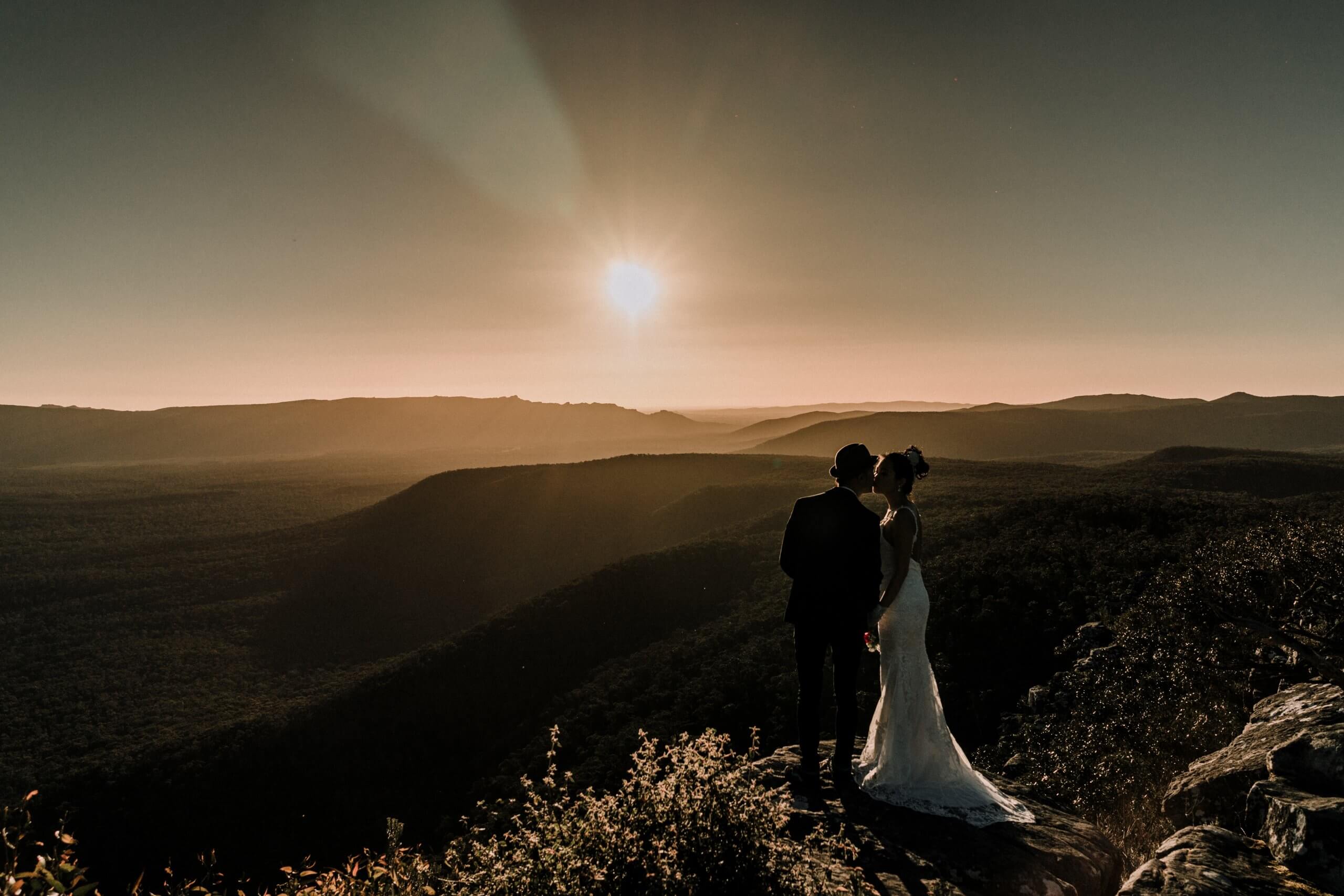 Beautiful couple with a stunning view of the mountains, captured by black avenue productions