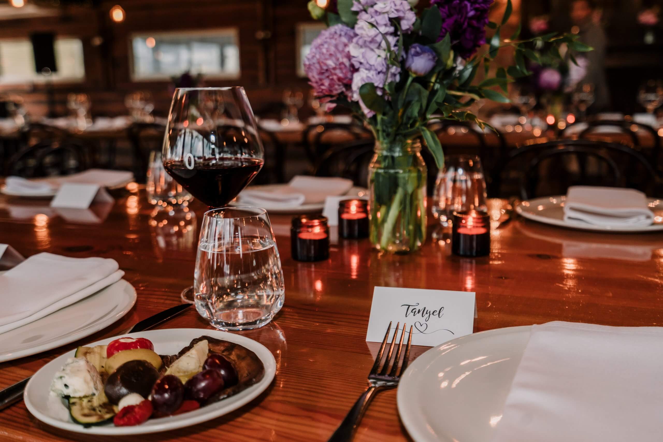 wine and great food was served at the guests' tables, captured by Black Avenue Productions