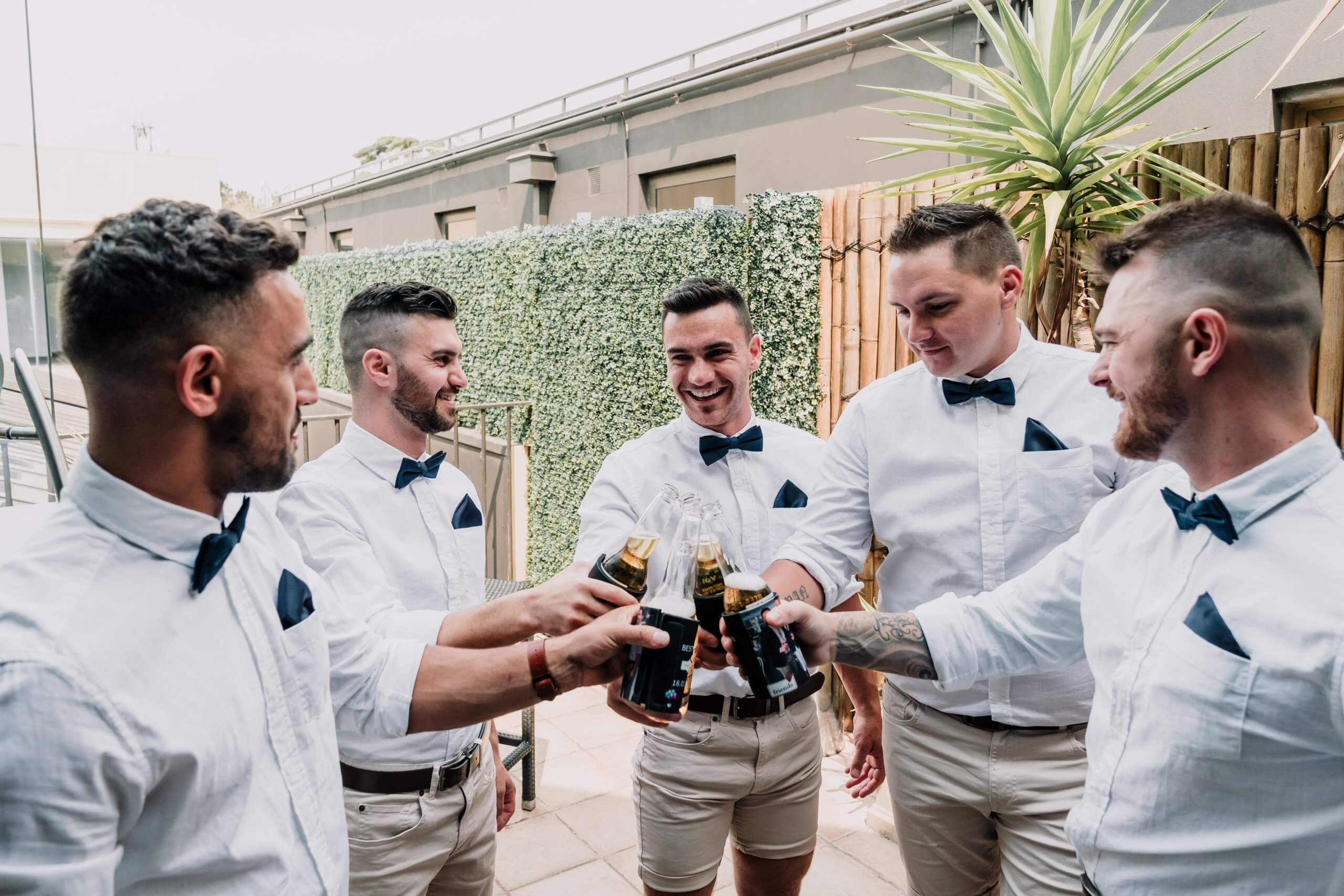 The groom with his groomsmen having a toast before the wedding starts, captured by Black Avenue Productions
