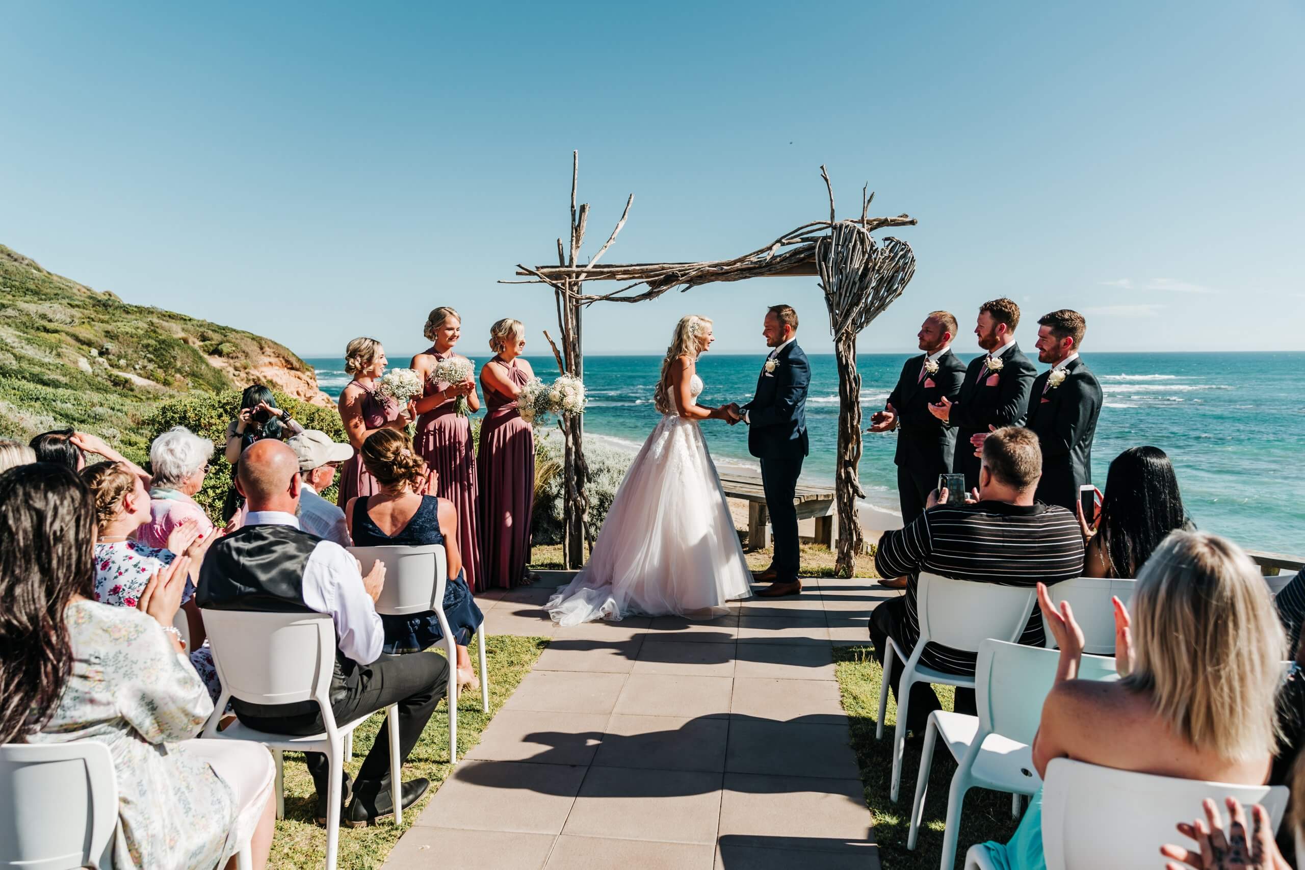The right wedding suppliers, this venue was arranged perfectly that would match the view of the mountain and the sea, captured by Black Avenue Productions