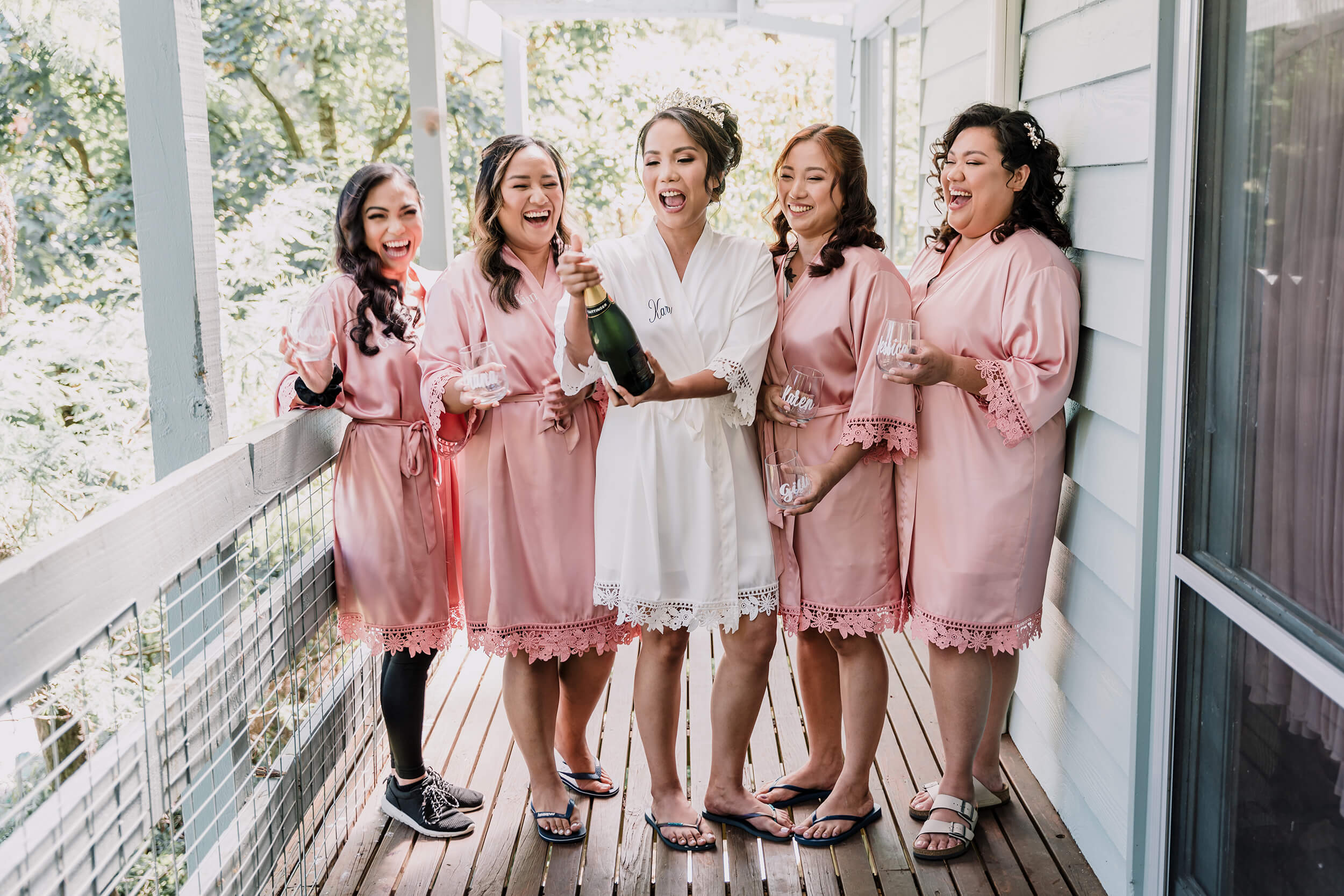 Bride have a toast with her bridesmaids before the wedding. Photo captured Black Avenue Production