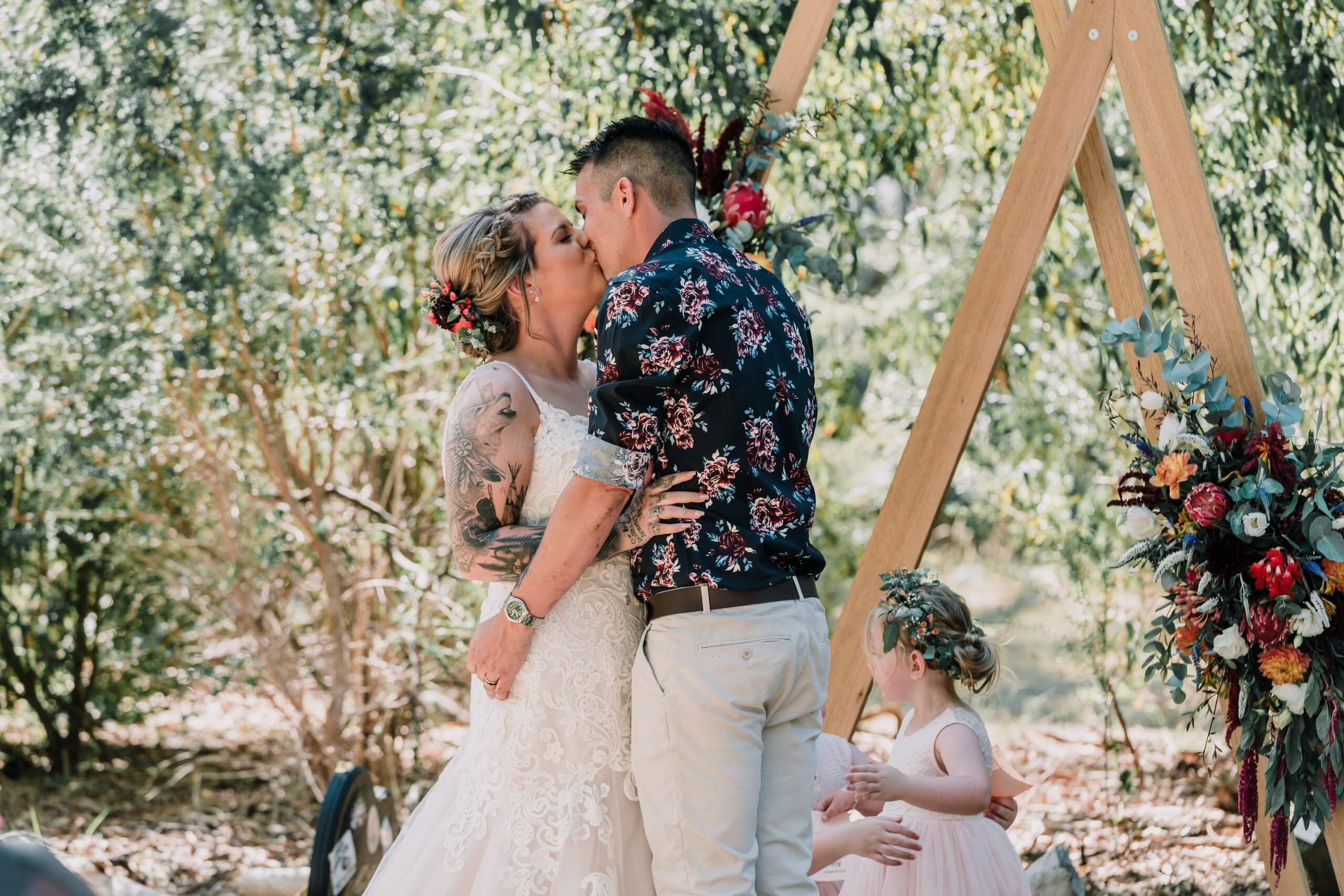 Bride and groom sealing their love with a kiss captured by Black Avenue Production