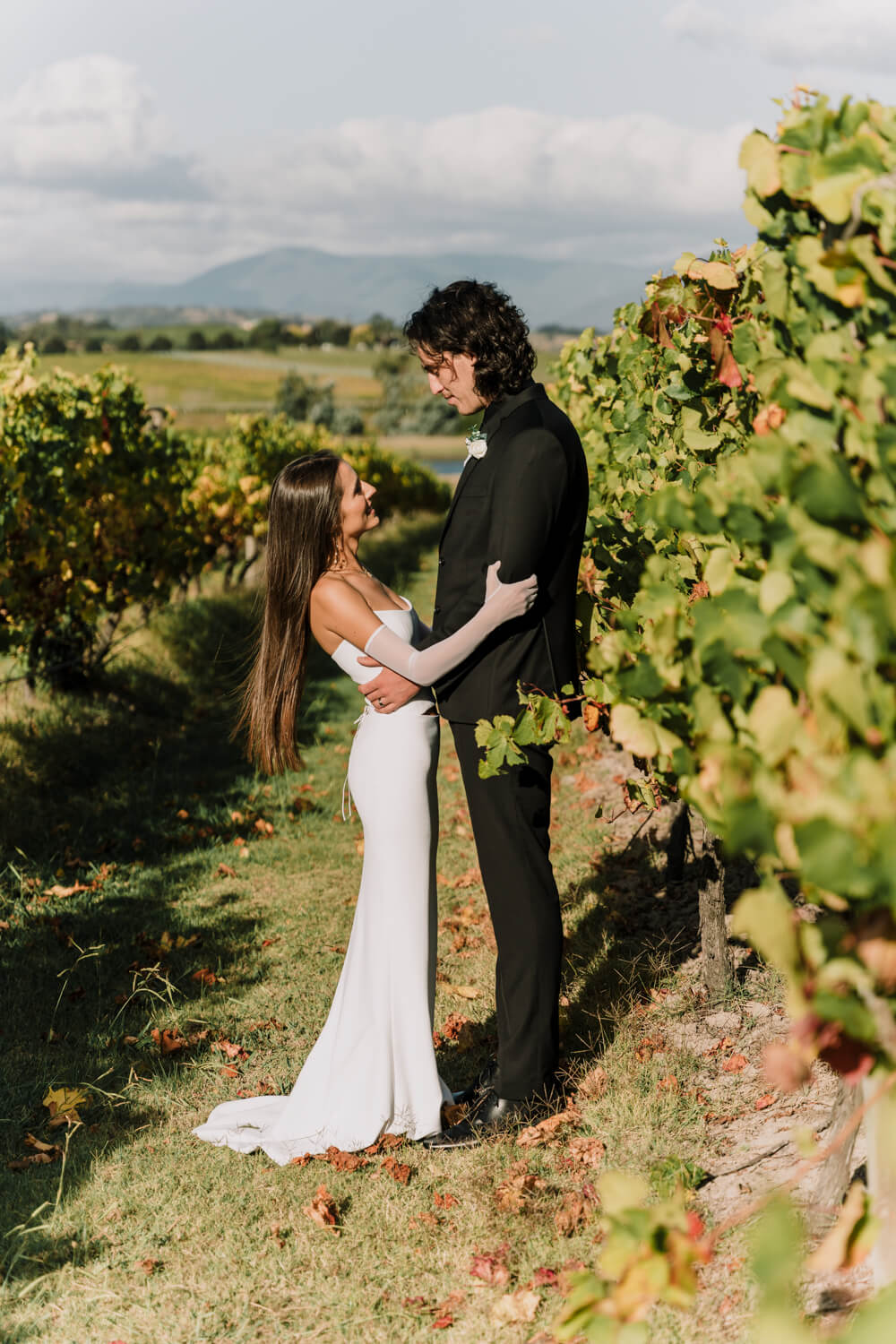 beautiful shot of the couple in a vineyard, Captured by Black Avenue Productions
