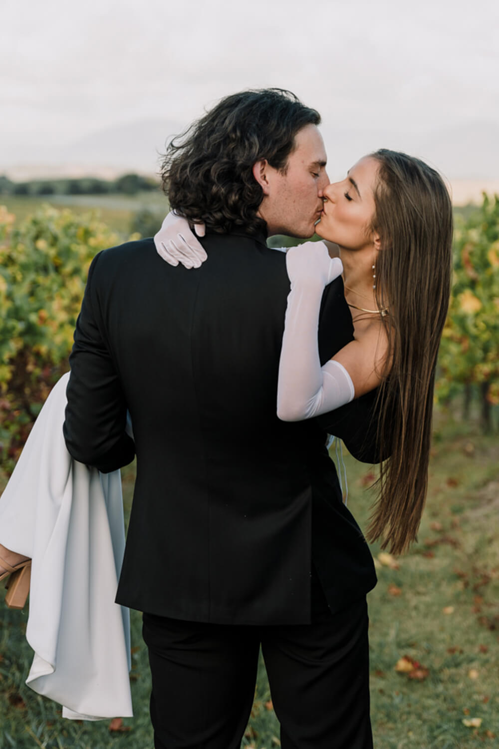 Engagement Shoot Mistakes To Avoid, Lovely couple showing their love by kissing. Captured by Black Avenue Productions