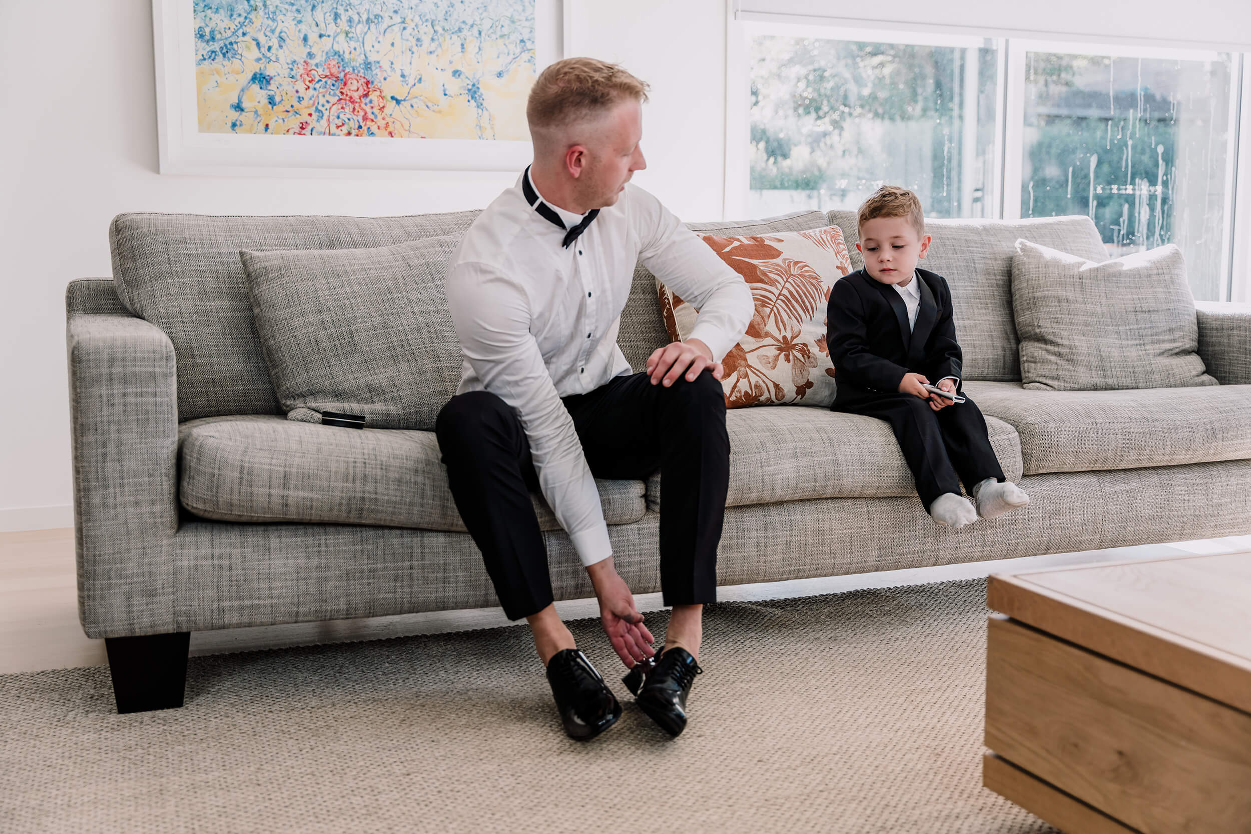 Groom preparing with his son, captured by Black Avenue Productions