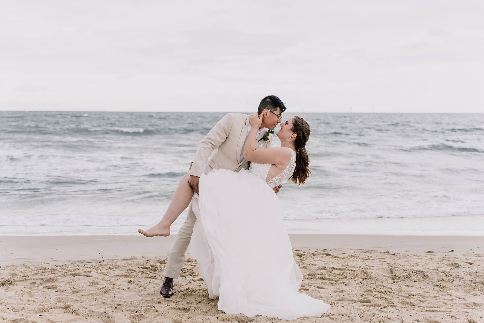 Engagement Photo Ideas, bride and groom poses by the beautiful beach by Black Avenue Productions