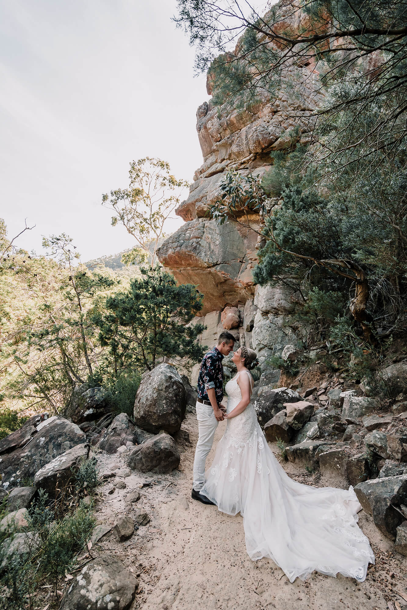 Engagement Photo Ideas, A beautiful shot of the bride and the groom looking at each other with love by the Grampians by Black Avenue Productions