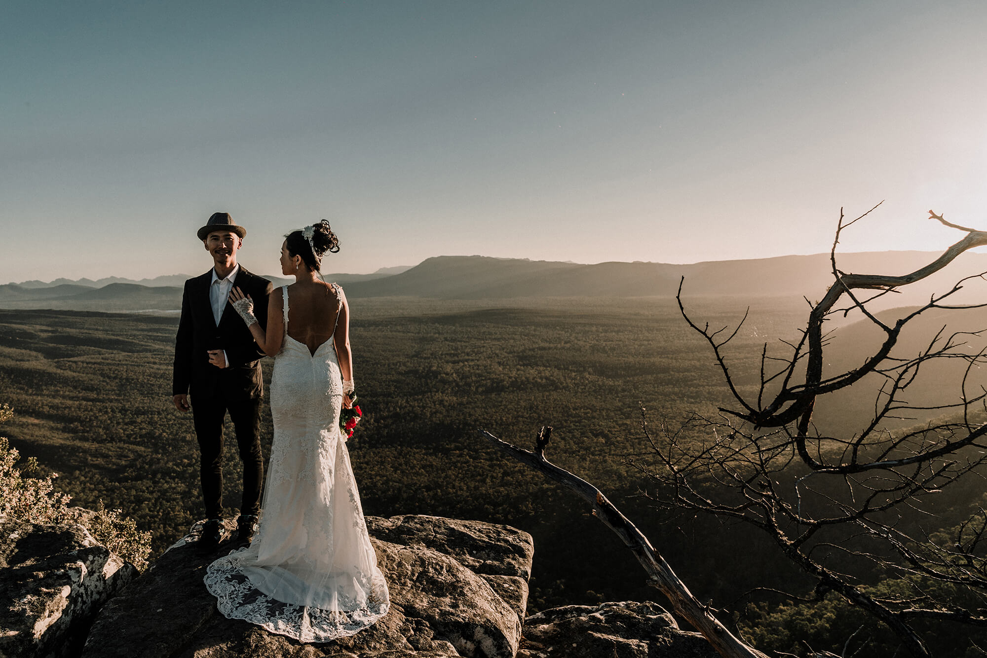 Engagement Photo Ideas, bride and groom poses this beautiful view of the mountain by the cliff by Black Avenue Productions