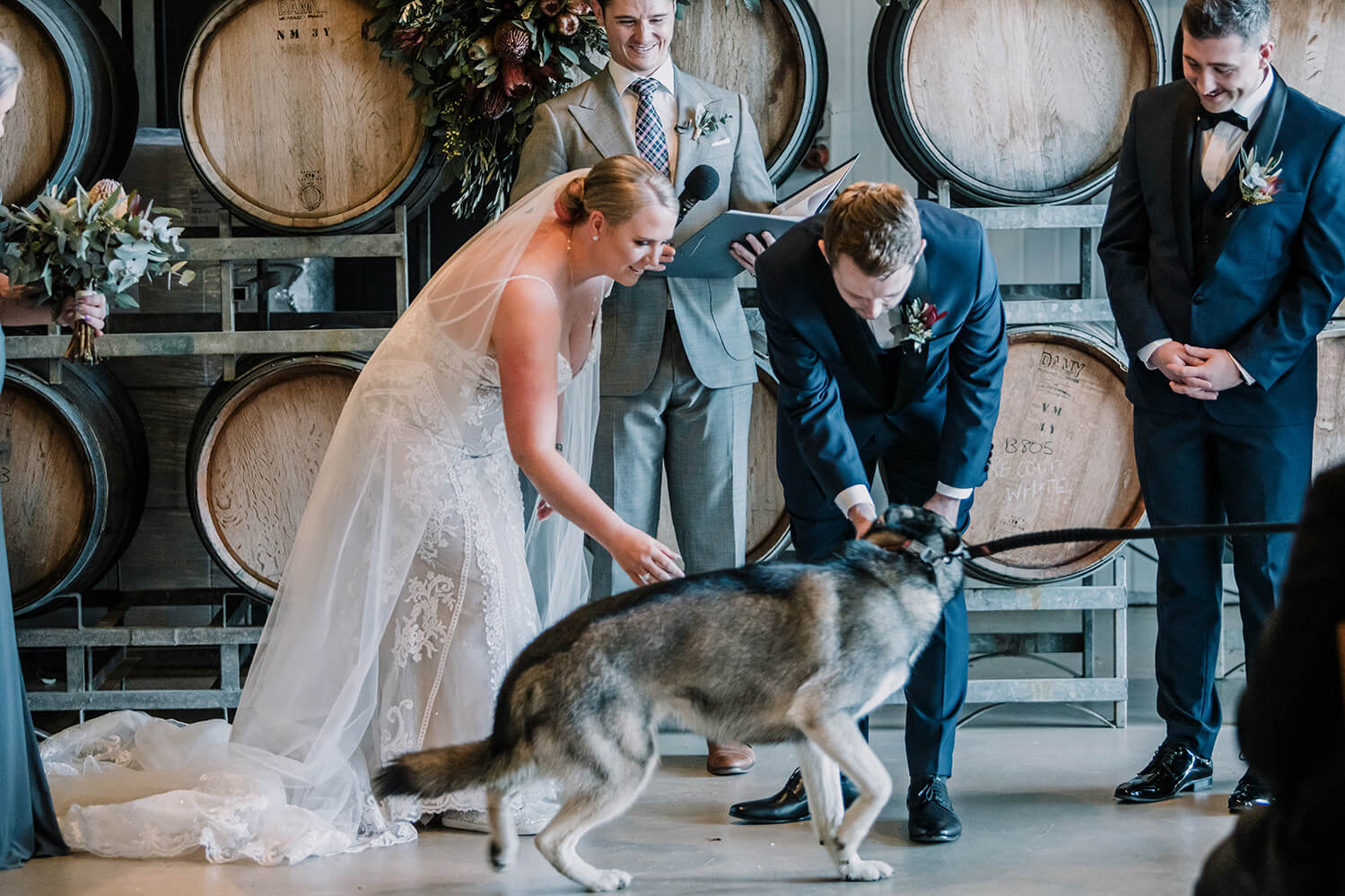 Awesome Ways to include your pet, dog stole the scene when it went in front and delivered the rings to the groom, captured by Black Avenue Productions