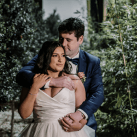 Australia newly wedded couple on their wedding day in wedding attire suit and gown capture by Melbourne wedding videographers and wedding photographer Black Avenue Productions