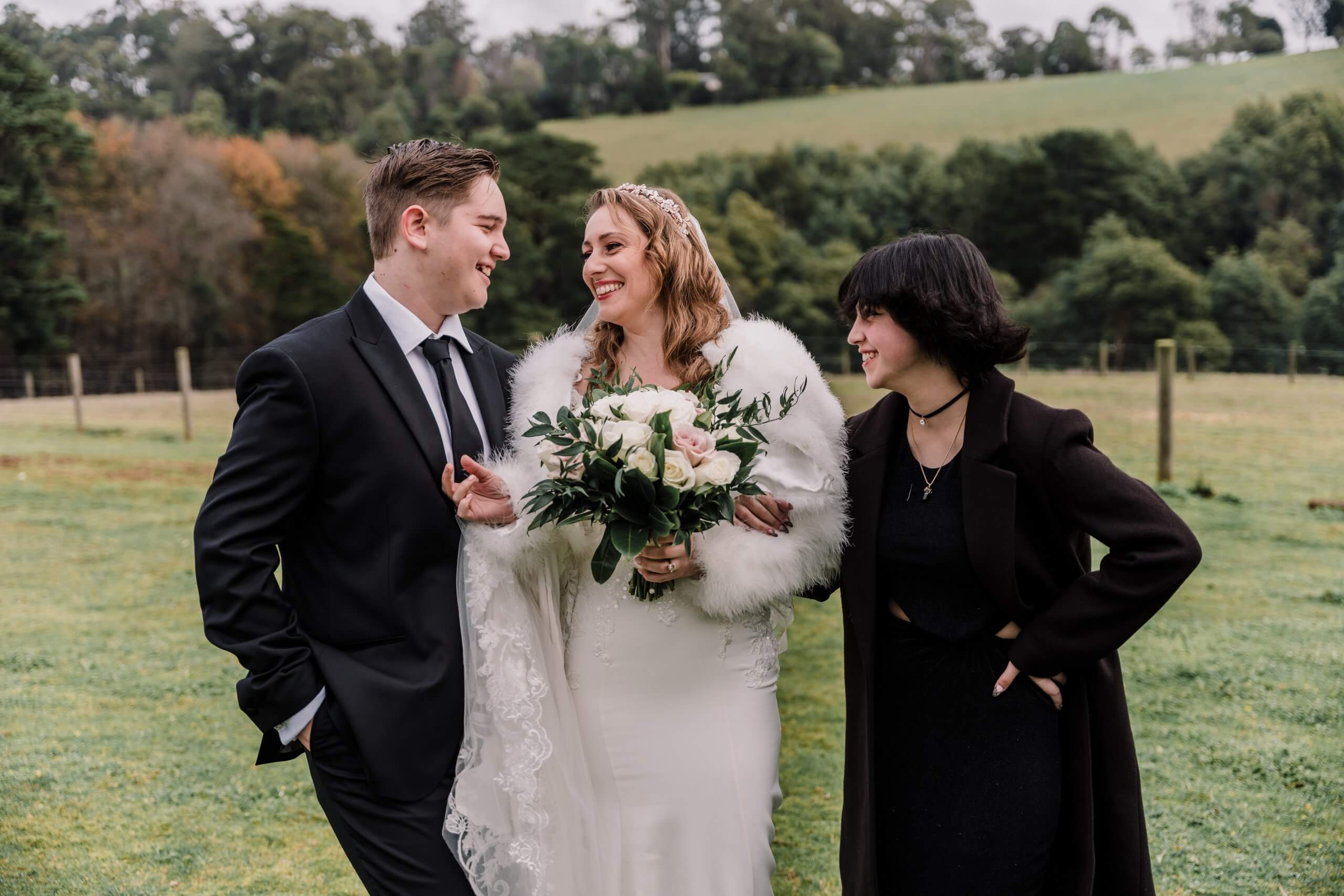 The bride posing with her close family