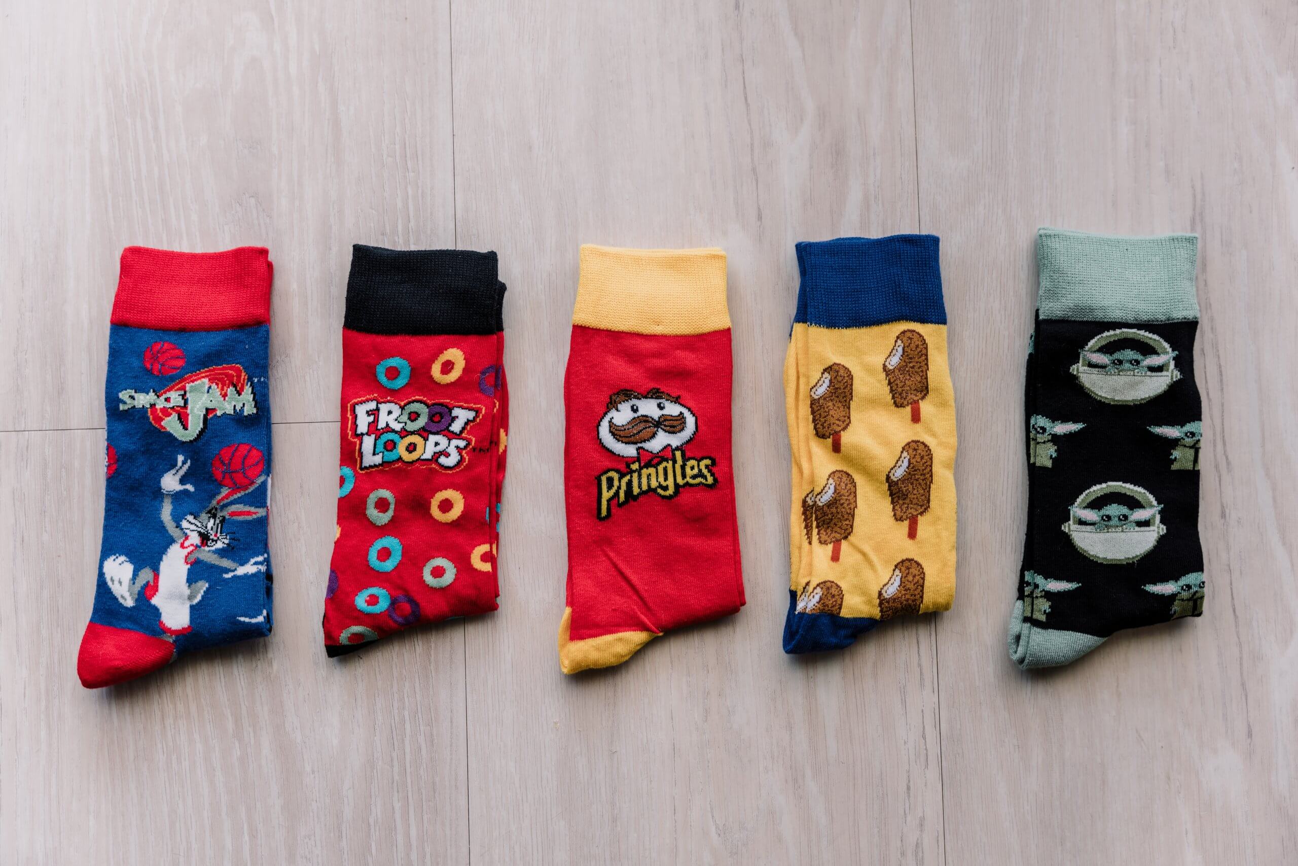 Detail shots of the groomsmen's parody socks