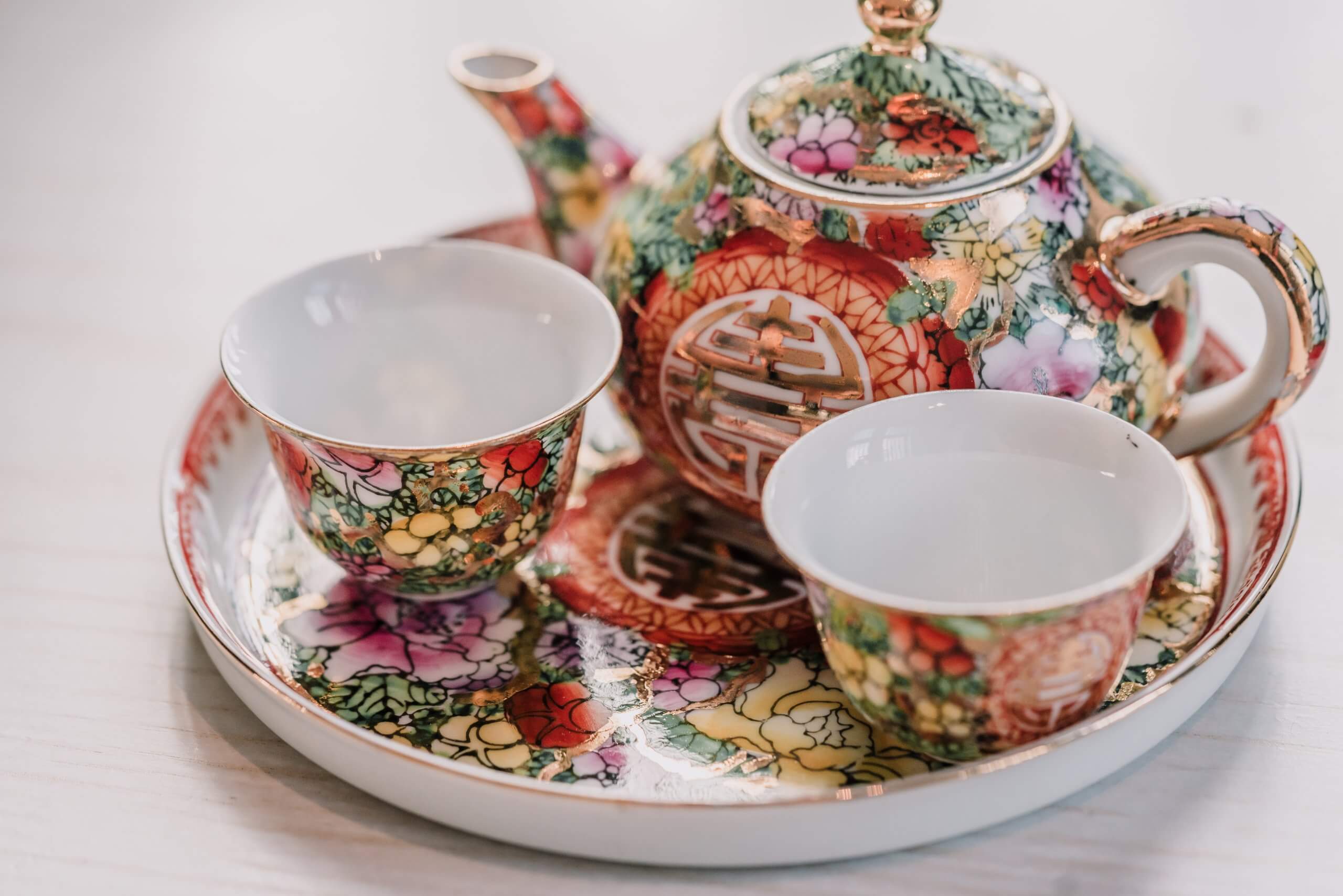 Detail shots of porcelain tea set used during tea ceremonies